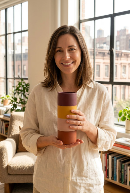 Female model holding Sunset Column vase