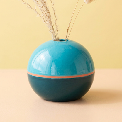 Tide Orbit vase styled with delicate dried stems