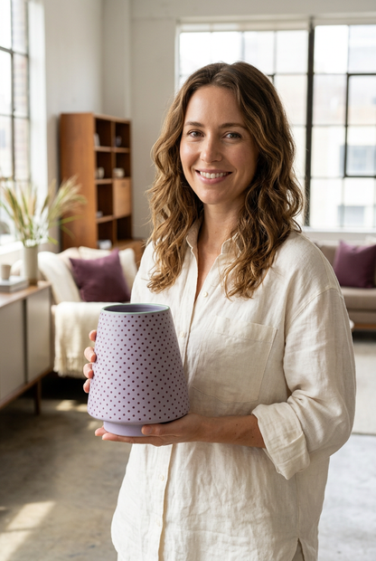 Female model holding Lilac Confetti vase