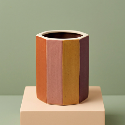 Earth Prism faceted vase on peach pedestal